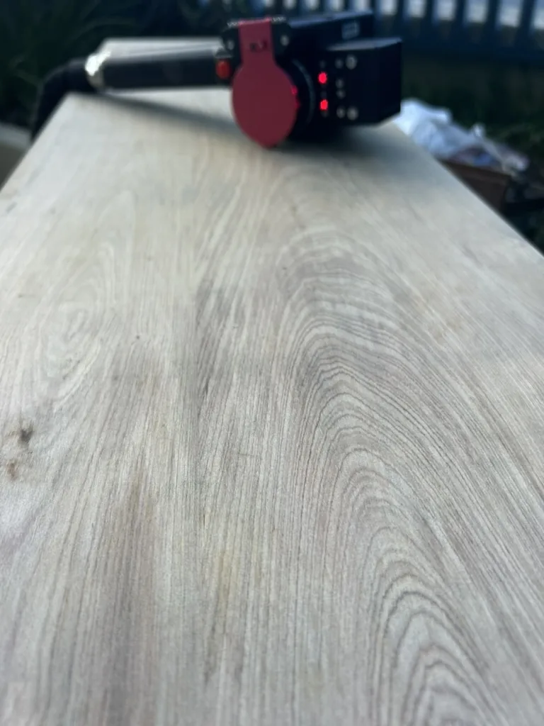 Graffiti removal demonstration surface